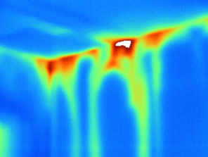 Infrared camera image showing air leakage in wall